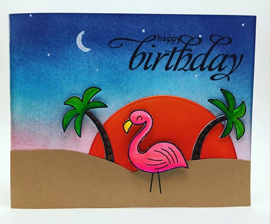 Happy birthday greeting card featuring beach sunset with flamingo