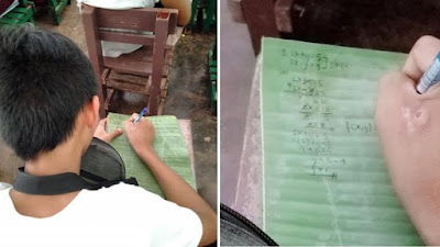 Miris! Tak Mampu Beli Buku, Anak Ini Menulis Pakai Daun Pisang