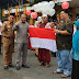 Ketua DPRD Kotabaru Hadiri Penyerahkan Bendera Merah Putih HUT RI Ke 77