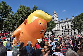 https://hollywoodlife.com/pics/donald-trump-protests-london-photos-baby-blimp-pics/