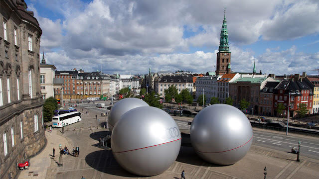 Three silver spheres from the air