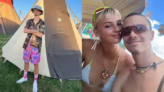 Romeo Beckham wears camouflage & rainbow print outfit at Glasto