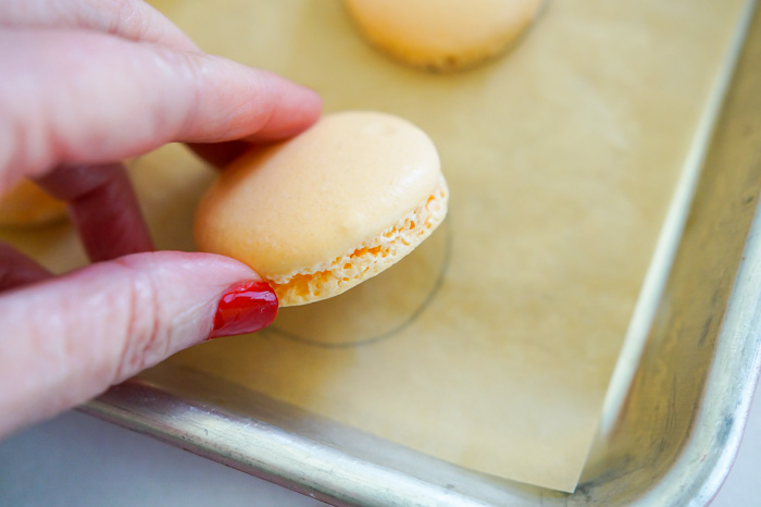 macaron lifting off parchment