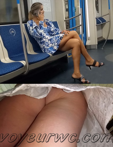 Upskirts N 3343-3357 (Upskirt voyeur videos with girls teasing with their butts on the escalator)