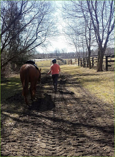 M walking with her horse, Jenna
