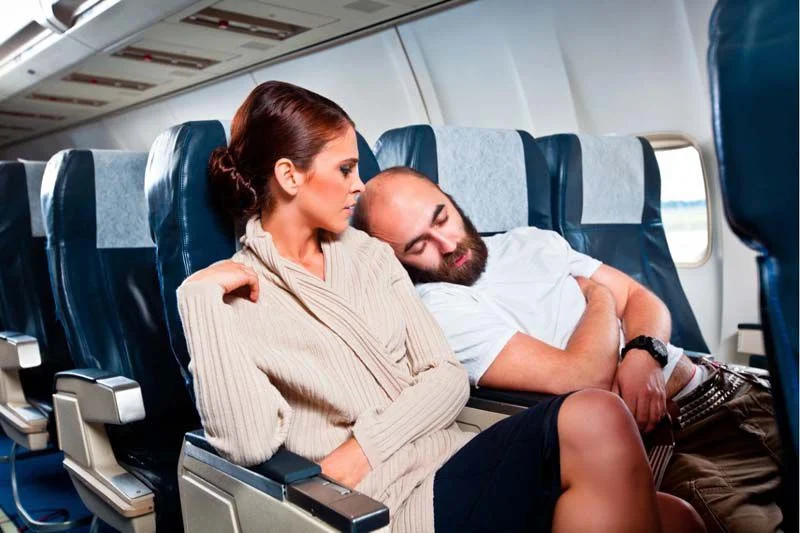 The Best Way to Fall Asleep on a Flight, Says Expert