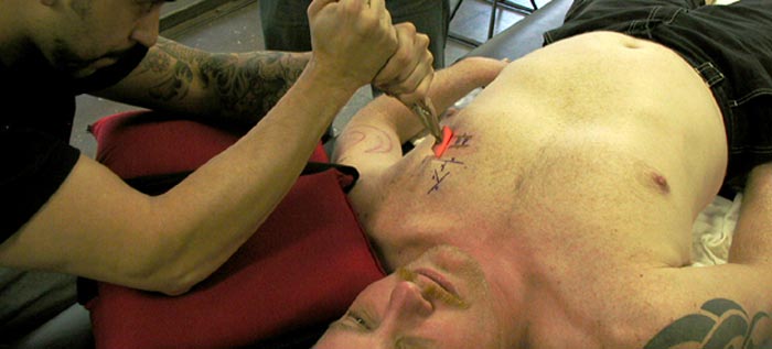 Human Branding Tattoo Sexy: justice tattoo