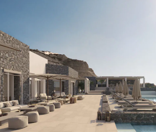 the outdoor pool space from a five star hotel in santorini