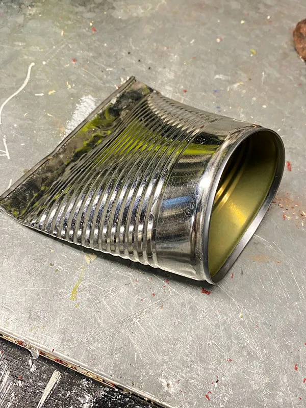 tin can with one side flat