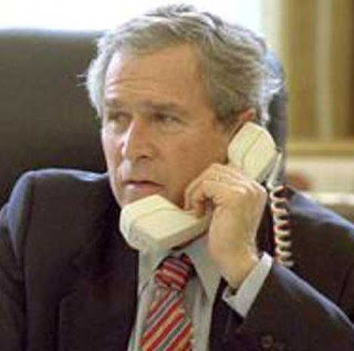 Bush fails to use a phone correctly