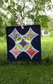 Bonnie and Camille Vintage Picnic cathedral window mini quilt