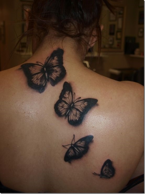 papillon_noir_tatouages_sur_le_dos