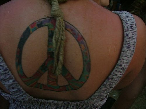 peace sign and flowers tattoo designs