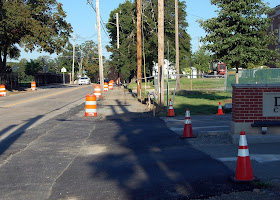 sidewalk work on the other side of West Central at Dean