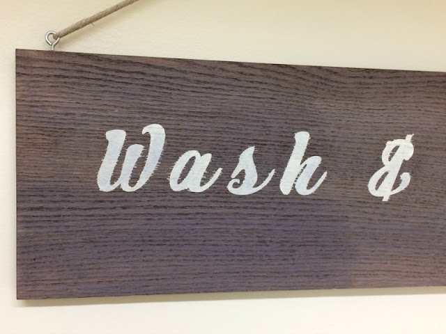 Use Wood Accelerator to age a plain board and make a stenciled farmhouse laundry sign!