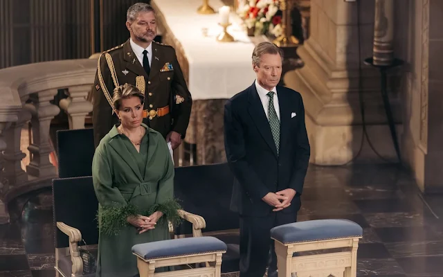 Grand Duchess Maria Teresa wore a green belted wool coat from Belgian fashion house Natan