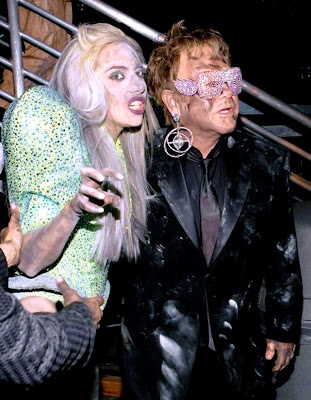  and Elton John backstage after their Sunday night Grammy performance, 