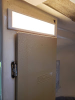 Light over closet door in U-haul Camper