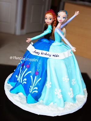 pretty elsa and anna doll cake, elsa and anna barbie dress cake