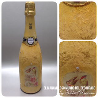 Botella de cava decorada con la técnica decoupage