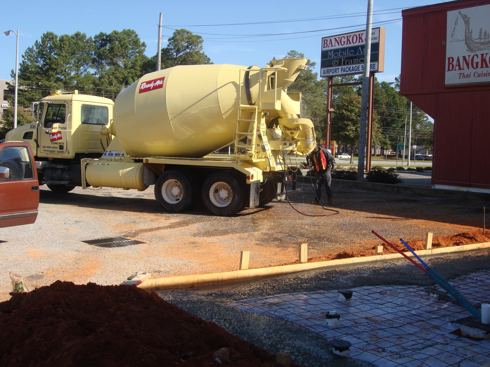 Concrete Truck Pouring Concrete For Front Slab