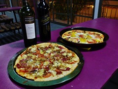 Pizza and wine feast.