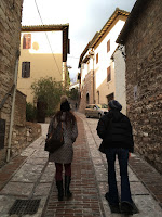 Climbing the hilly cobbled streets of Spello, Umbria, Italy