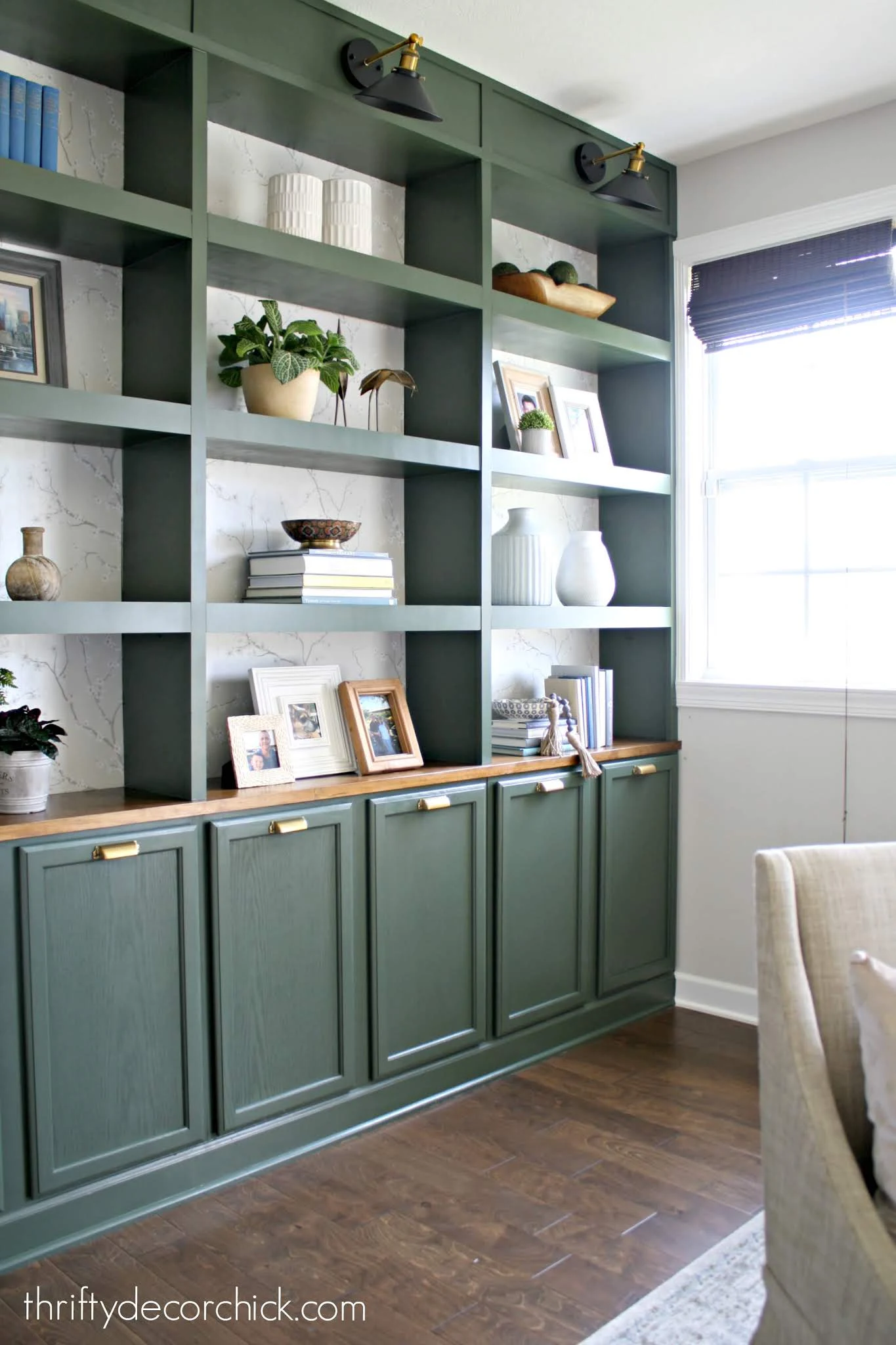 Dark green DIY built in bookcases