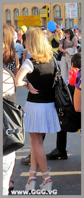 Girl in white skirt on the street