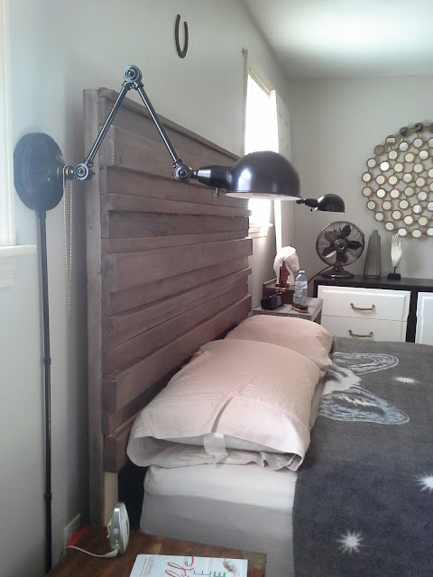 Master bedroom, wall lamp, rustic headboard