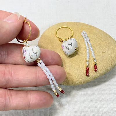 Rabbit ceramic bead on thin wire hoop earring with bead fringe