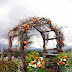 Rustic arbor covered with roses