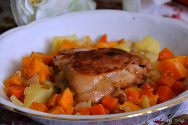 Sofrito dish with chicken, yam, potato and carrot