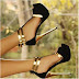 Black and gold high heel shoes