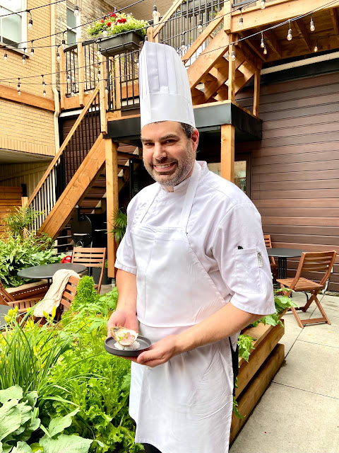 Charles Gignac, owner-chef of Le 101 Restaurant de quartier, with a William oyster from Quebec.