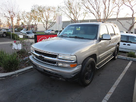 Vandalized Chevy Tahoe after complete repaint at Almost Everything Auto Body