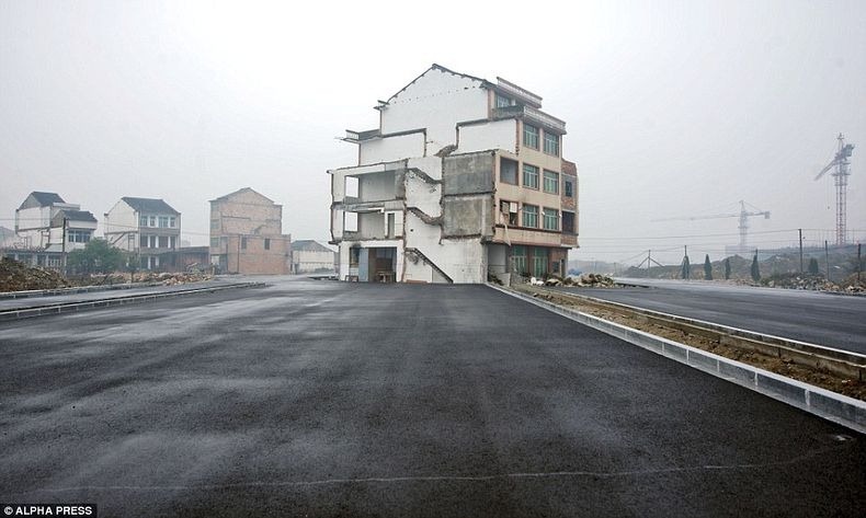 house-middle-of-road-1