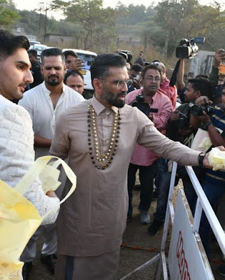 Suniel Shetty and son Ahan Shetti distributed sweets to media members