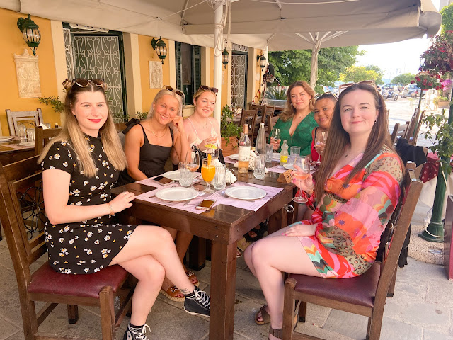 girls on holiday at greek restaurant