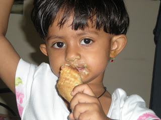 baby girl photograph eating icecream