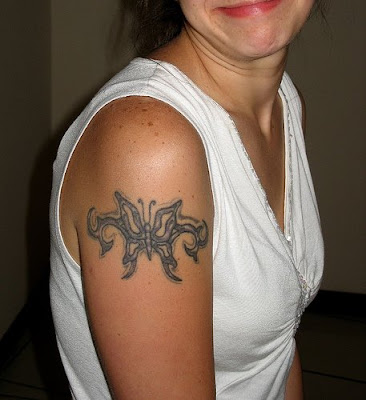 Tribal Tattoo For Women. butterfly tribal tattoo arm