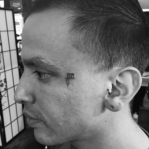 Meet Jon Boy And His Minimalistic Micro Tattoos