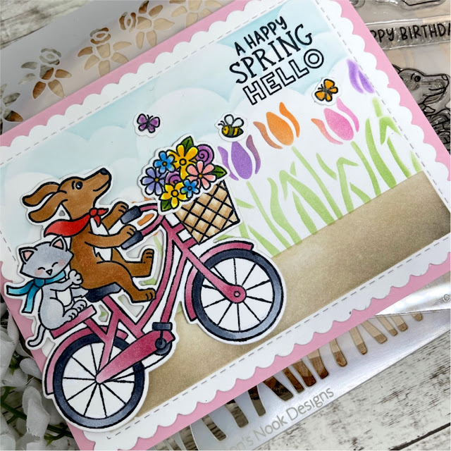 Cycling By with a Spring Hello Card by Donna Idlet | Cycling Friends Stamp Set, Spring Blooms Oval Stamp Set, Clouds Stencil, Spring Garden Line Stencil and Frames & Flags Die Set by Newton's Nook Designs #newtonsnook #handmade