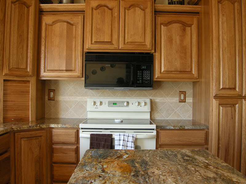 Kitchen Update: Stone Backsplash & Window Wrap title=