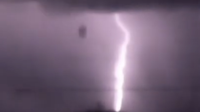 Massive UFO sighting falling to Earth during thunderstorm.
