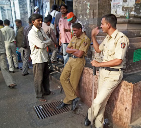 policemen outside VT railway station