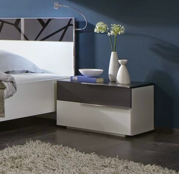 ultra modern white bedside table in blue bedroom design