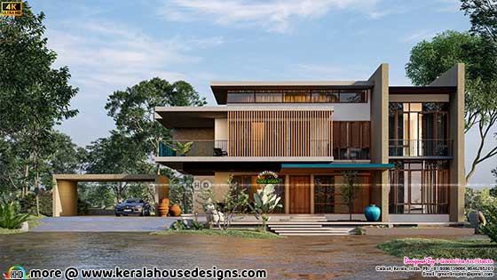Modern Tropical Glass Front Elevation of a Luxury Kerala Home Design