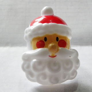 Father Christmas plastic ring from Greggs