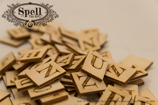 A stack of wooden letter tiles.